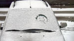 melting smiley face on a snowy car window by Nexu4