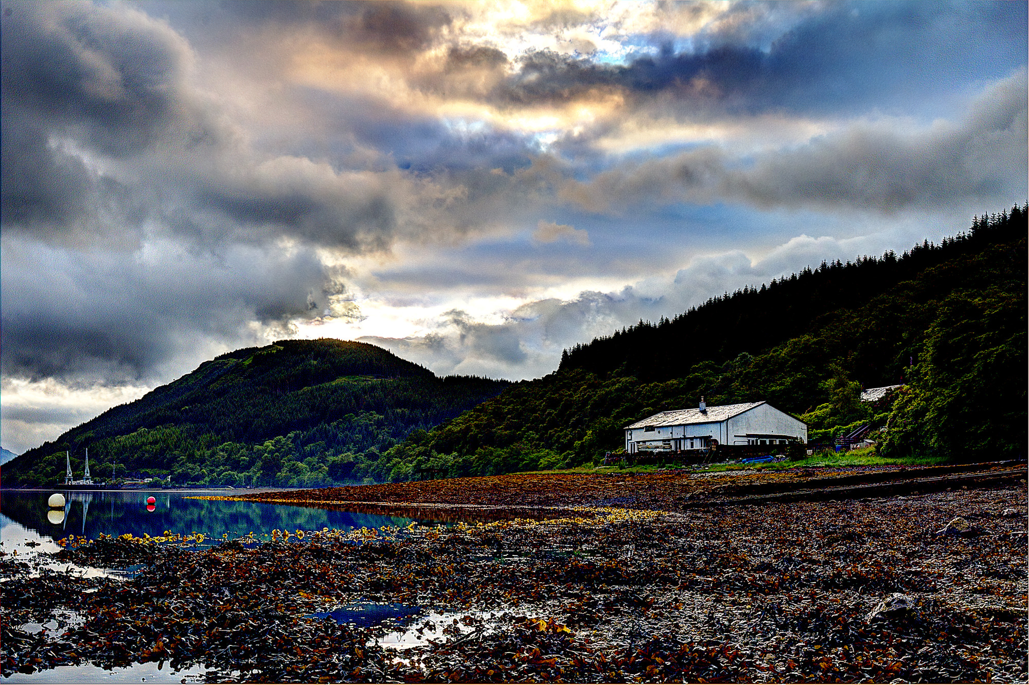 Lochside cottage at sunset