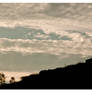 Girl, hill and sky