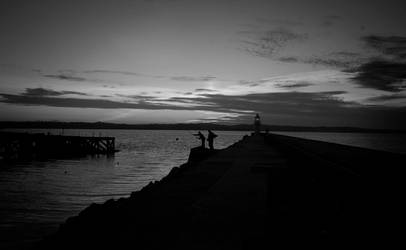 Fishing by the Lighthouse