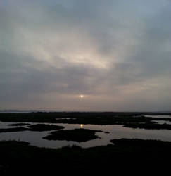 praia de faro portugal / Sunset cloudy skies