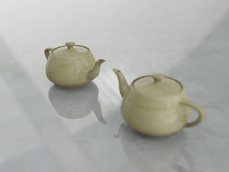 Two teapots facing eachother