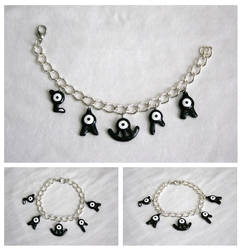 Pokemon Unown charm bracelet: LAURA