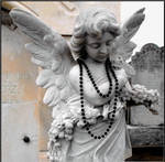 Angel With a Black Mardi Gras Bead by SalemCat