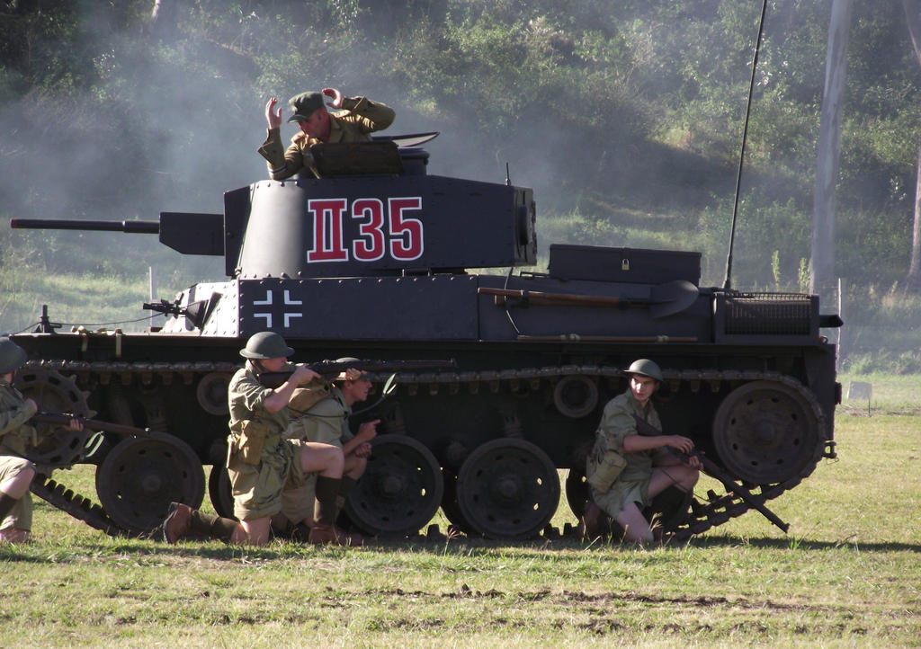 Taking Cover behind the captured tank