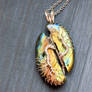 Tree pendant with a broken labradorite.