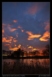 Sunset above pond