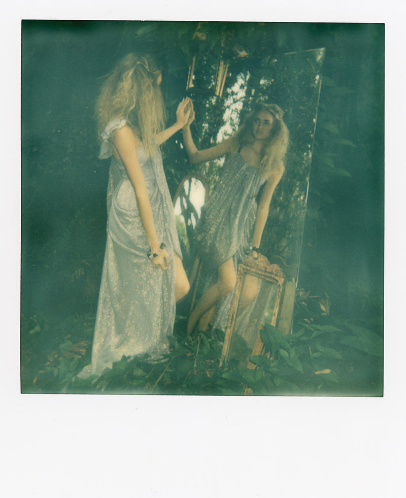 Curiouser and Curiouser Polaroid 2 by Queen-Kitty
