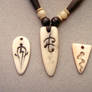 three bone pendants