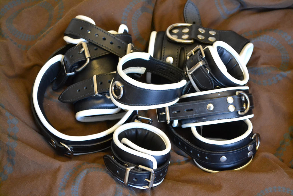 Pile of leather restraints by Plasma-dragon on DeviantArt