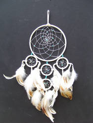 Large white dream catcher with 4 smaller rings