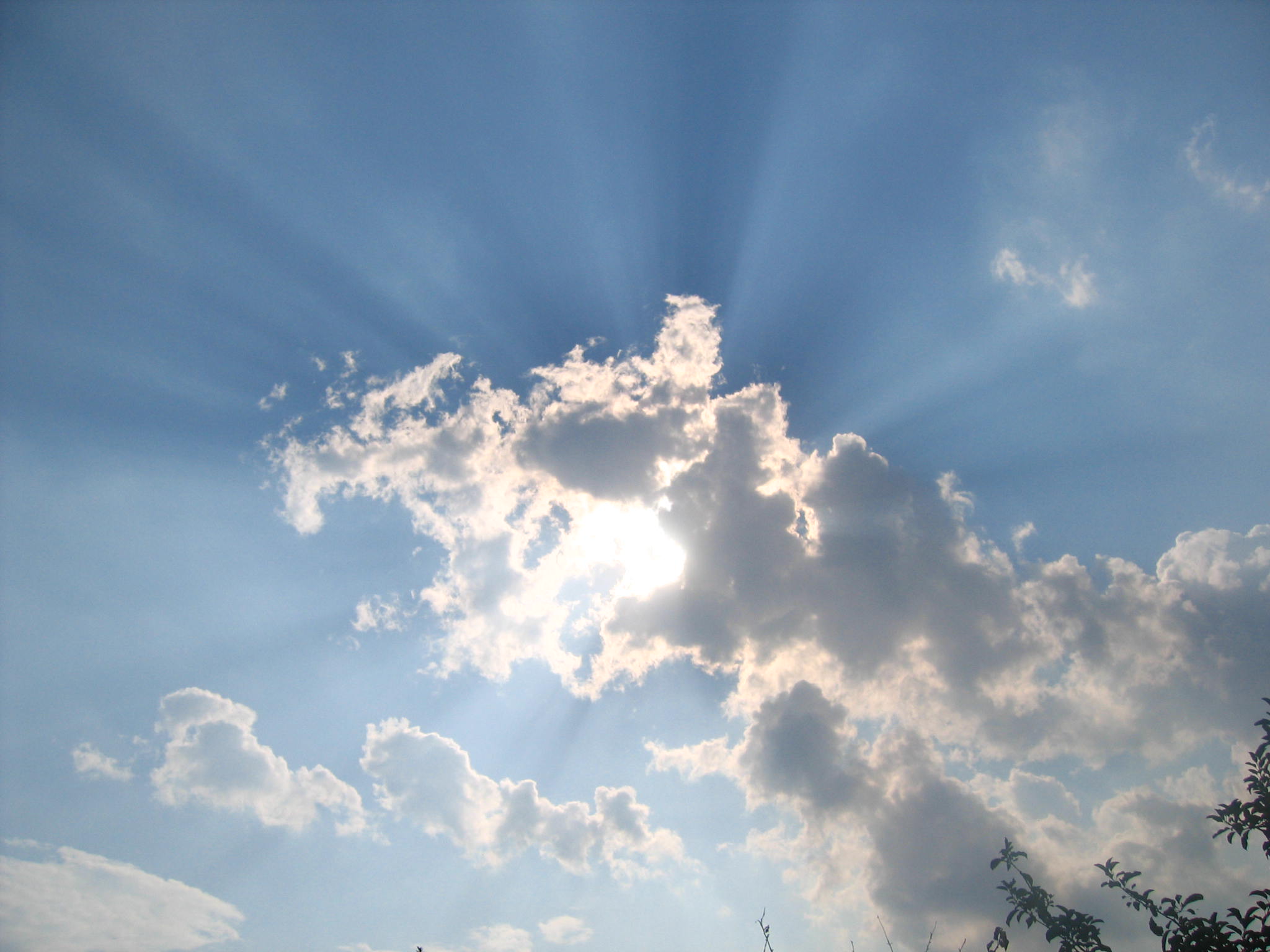 Sun behind a  cloud