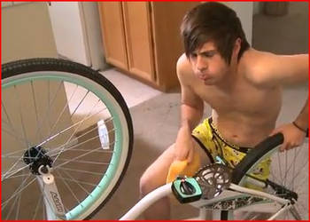 Anthony Cleaning a Bike.