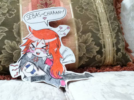 Grell Glomps Sebby on my Couch