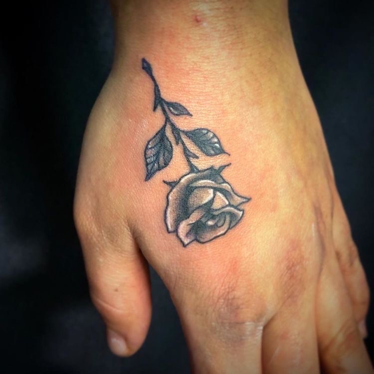 black rose tattoo hand