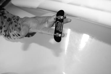 Fingerboarding in bathroom 3