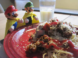 Mario and Luigi with a big plate of Spagehtti