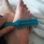 brushing my feet with another tool :)