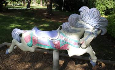 White and Purple Carousel Horse