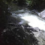 On A Rock Watching The Water