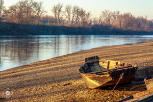 Boat by river