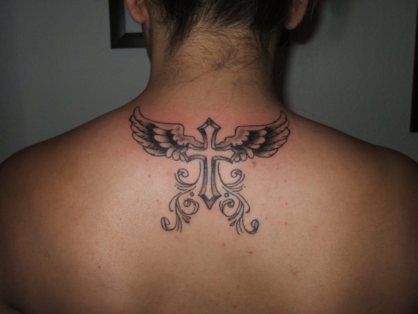 Cross and wings on back