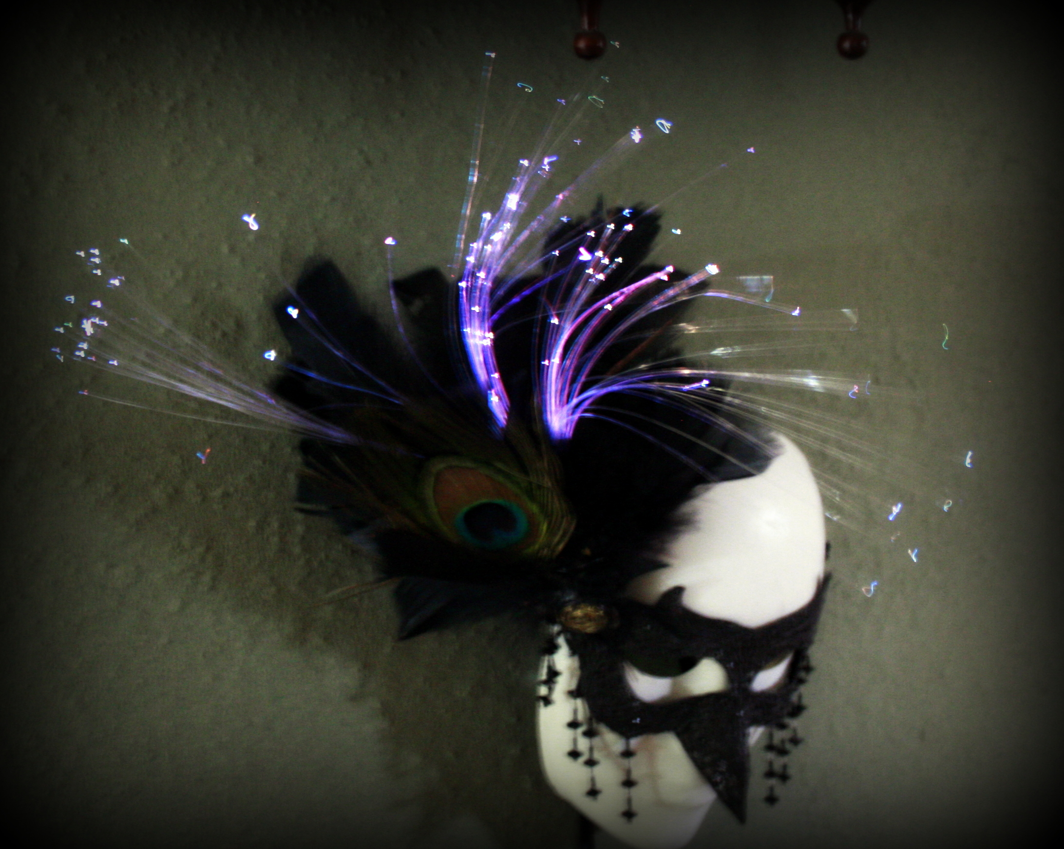 Led fiber optic raven mask.