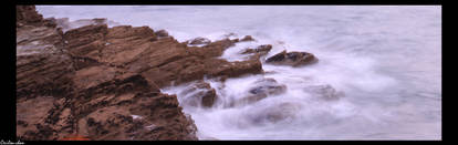 the sea rolling on rocks