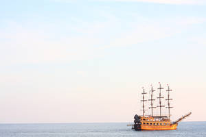 Photography of Brown Wooden Ship on Body of Water