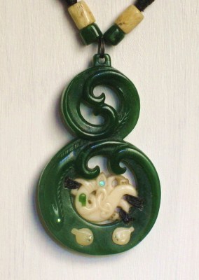 jade and bone carved pendant