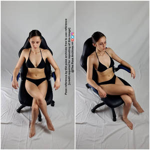 Female Sitting Back in Chair High Angle Pose