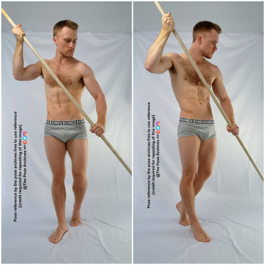 Male Warrior Holding Staff Low Angle Pose 2