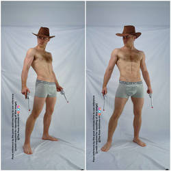 Male Cowboy Standing with Revolvers Pose