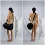 Female Standing with Gym Bag Back View Pose