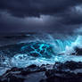 Biolucent storm on the ocean shore