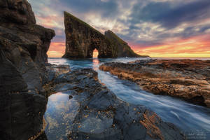 The rock arch in the sea