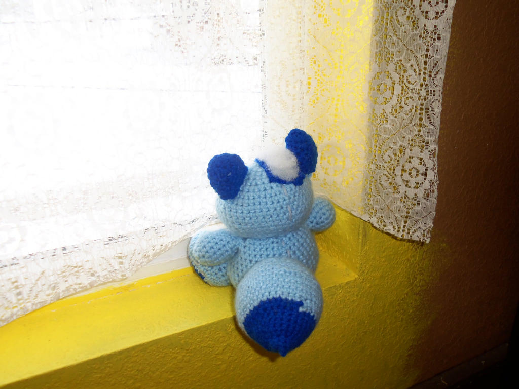 Little Blue Fox looking out the window