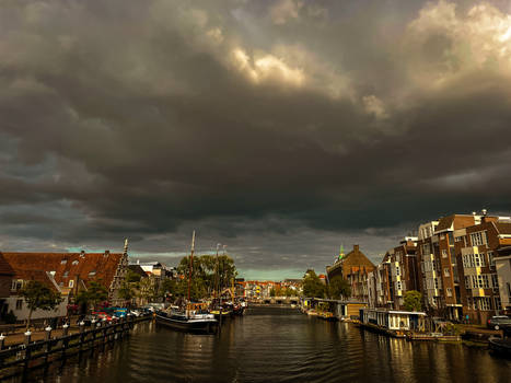 Dutch canal with dark sky