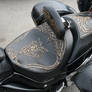 motorcycle saddle wolf. gold.