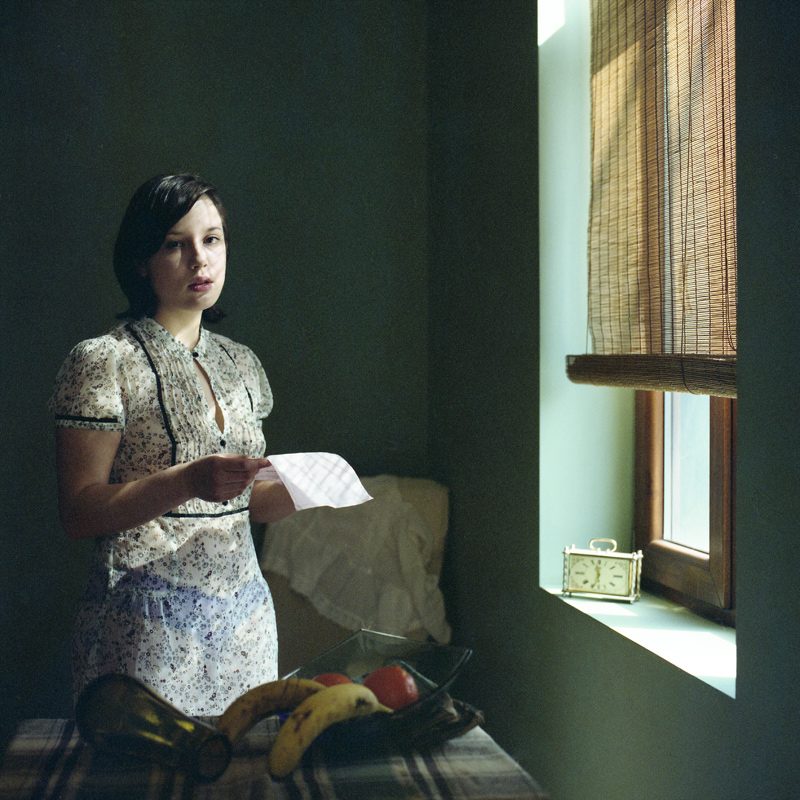 girl reading a letter