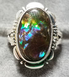 Full specturm ammolite ring.