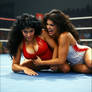 In 1985 2 beautiful, curvaceous Maltese women aged 35 with lustrous curly tousled black hair in a 19