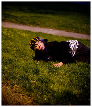 drunk man smoking on gras