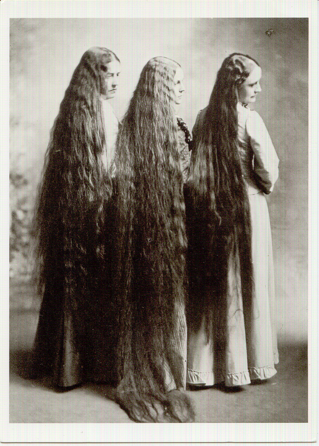 3 long haired women 1900