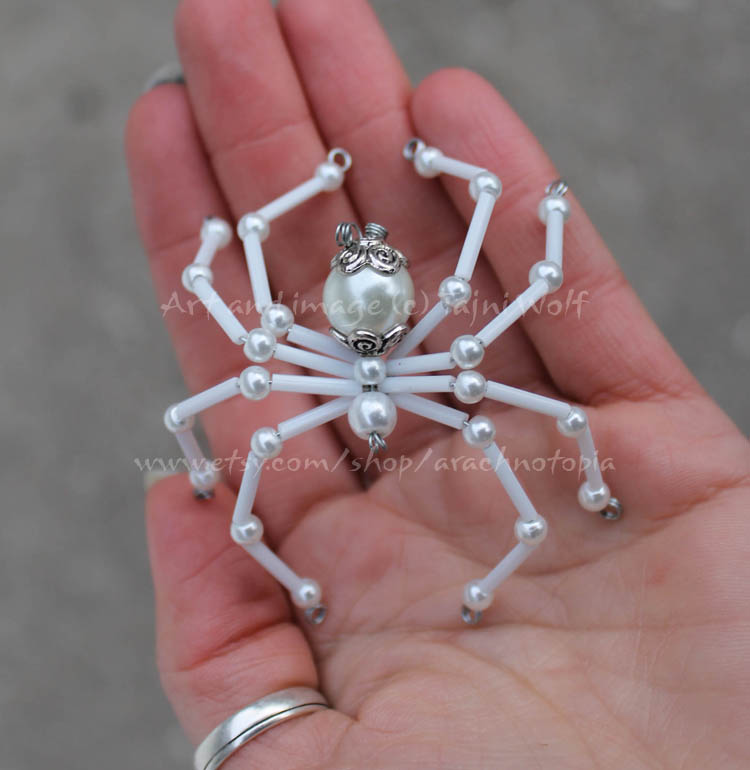 Lg white glass pearl spider with bead caps no. 2