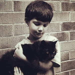 boy and his cat