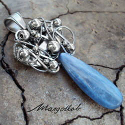 wirewrapped kyanite steel pendant