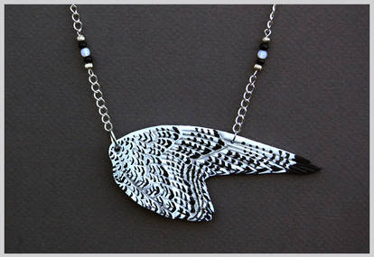 Gyrfalcon Wing - Leather Pendant