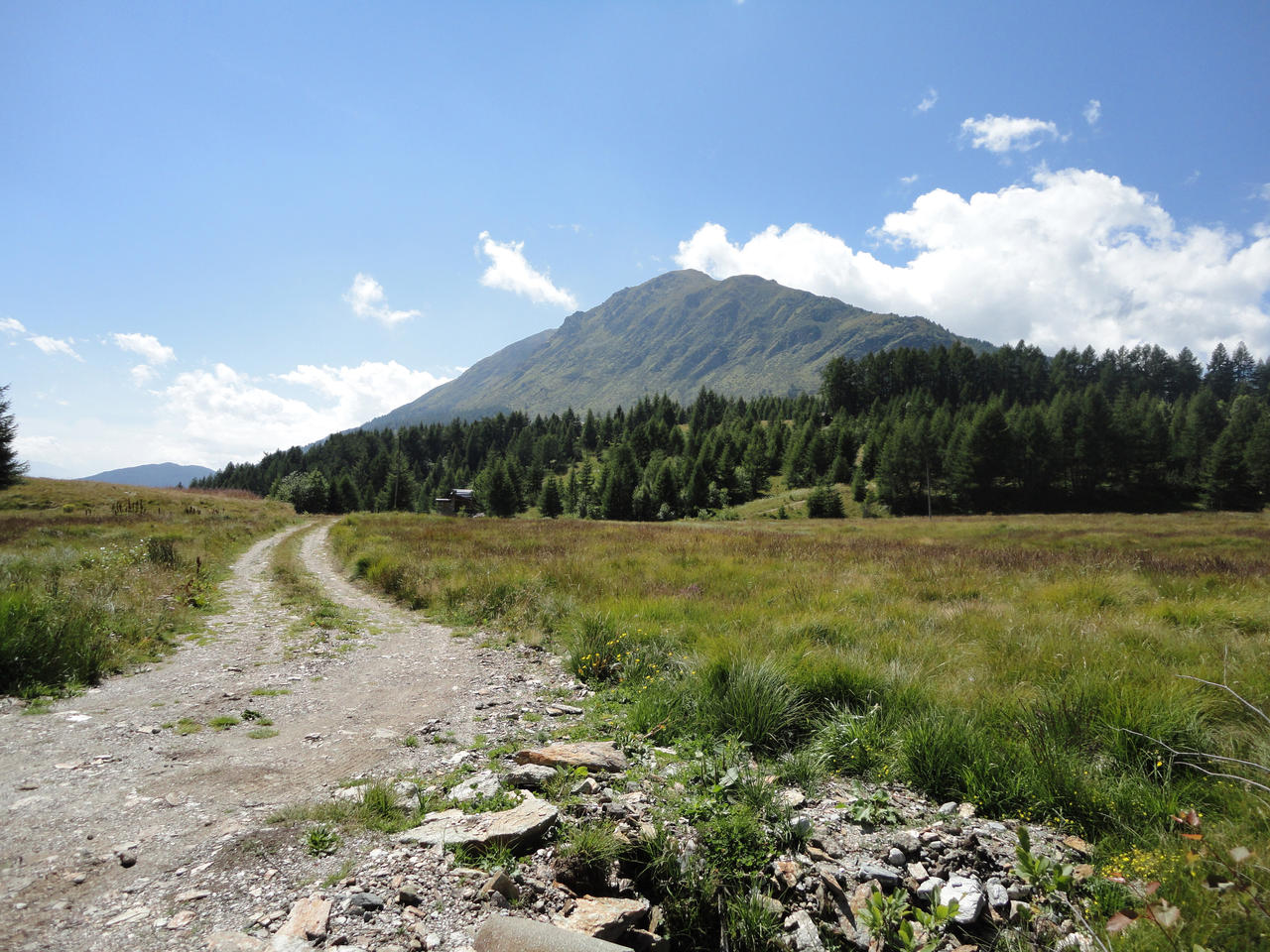 Dirty road on mountains by Simbores