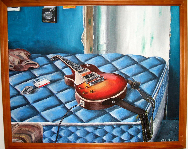 The Guitar On The Bed